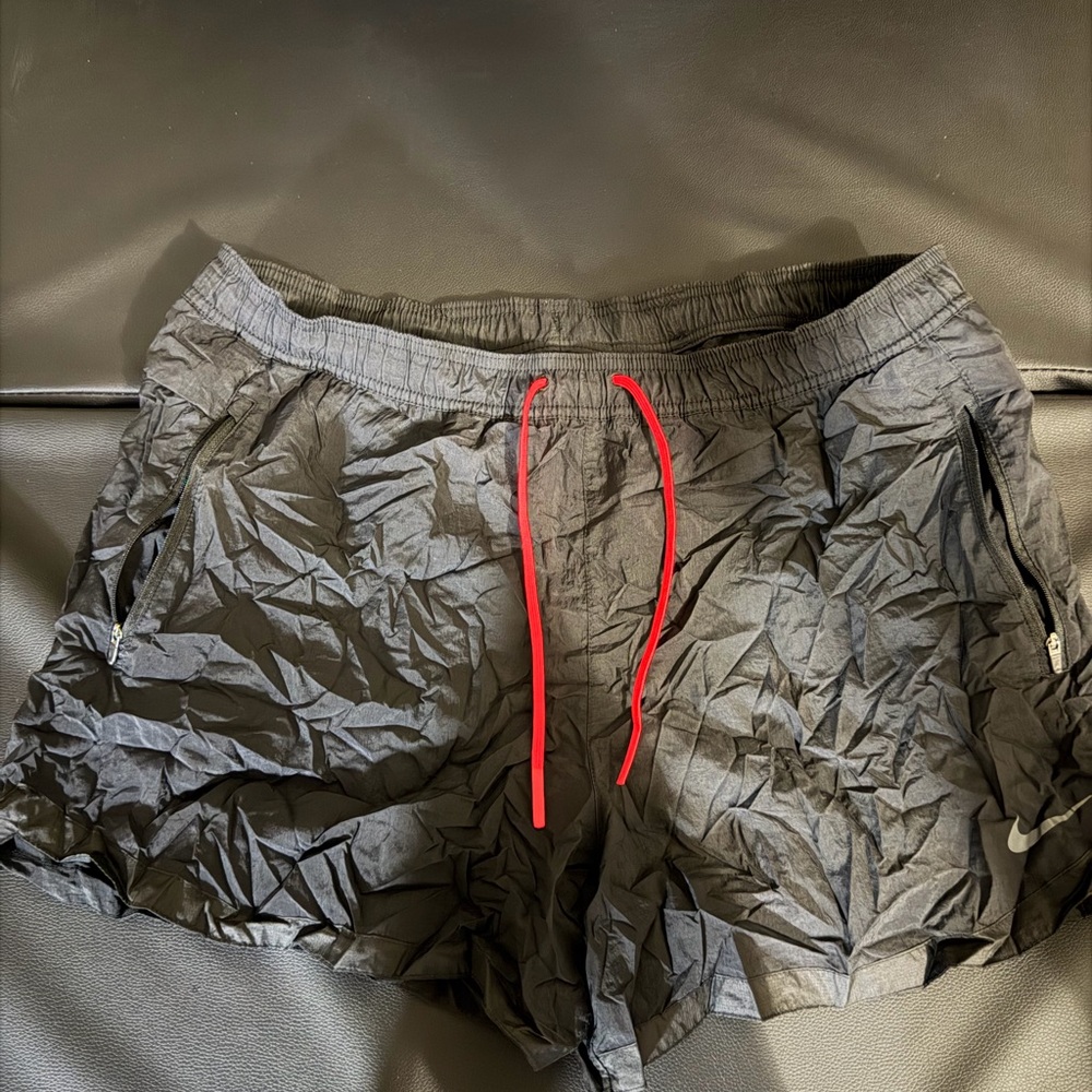 Nike Black and Gray Patterned running shorts (packable) and lined tights